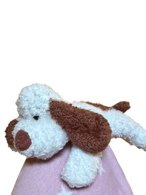 Brown and white plush dog